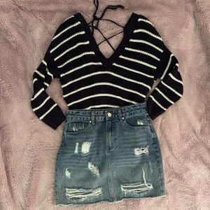 Navy blue and white striped V neck sweater with open back